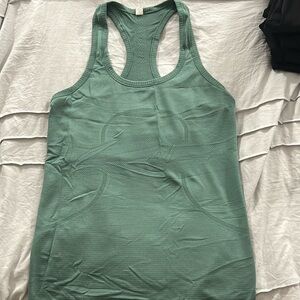 Green lululemon size 6 tank. New with no tags